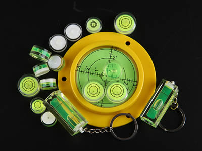 There are five plastic circular bubble level vials and four plastic tubular bubble level vials in different sizes.